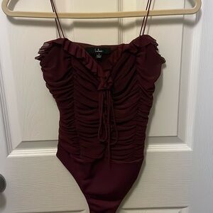 Ruffled bodysuit from Lulu’s